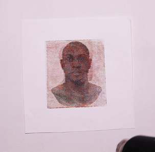 Thermochromorph printed portrait changing with heat